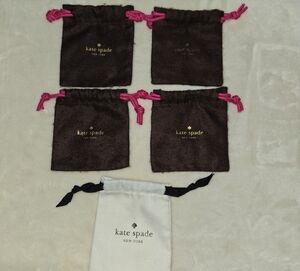 Kate Spade Brown and White Pouches with Pink and Black Drawstrings